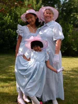Deb and daughters in matching outfits she made
